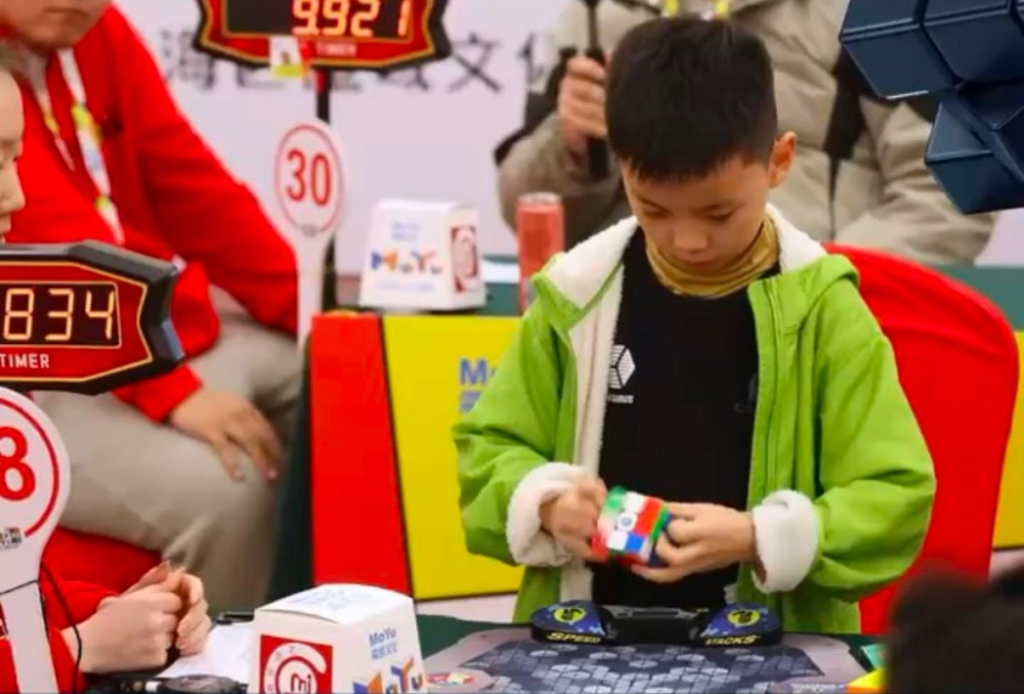 какой мировой рекорд по сборке кубика рубика