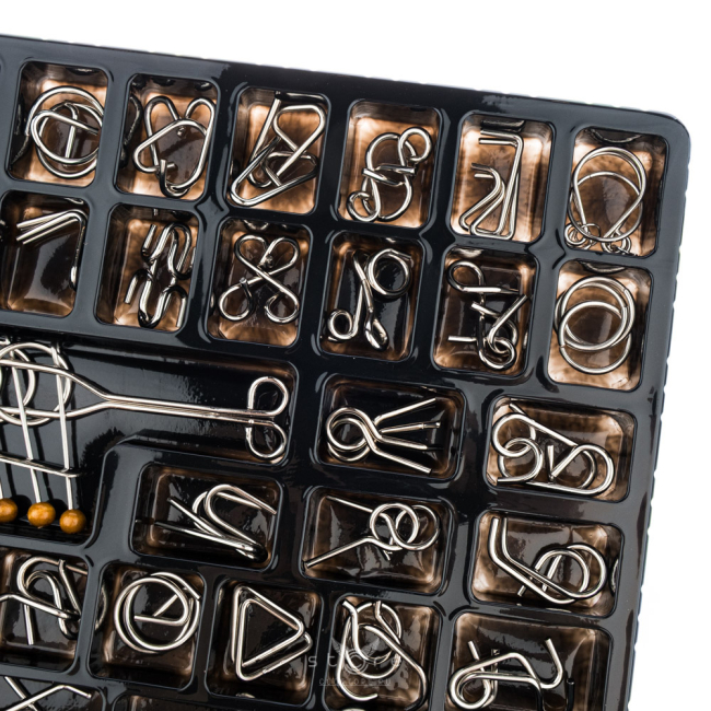 купить головоломку набор из 50 металлических головоломок