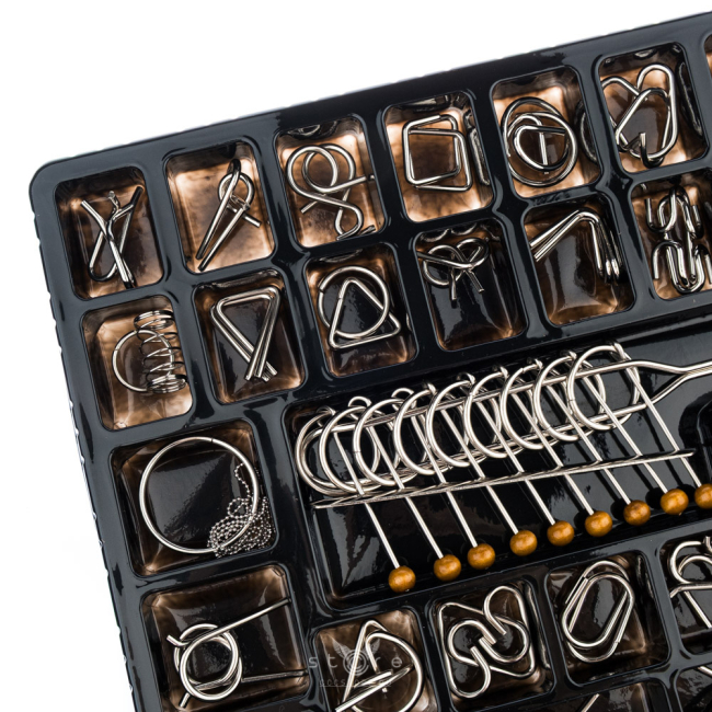 купить головоломку набор из 50 металлических головоломок